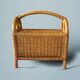 Vintage wicker and bamboo magazine rack