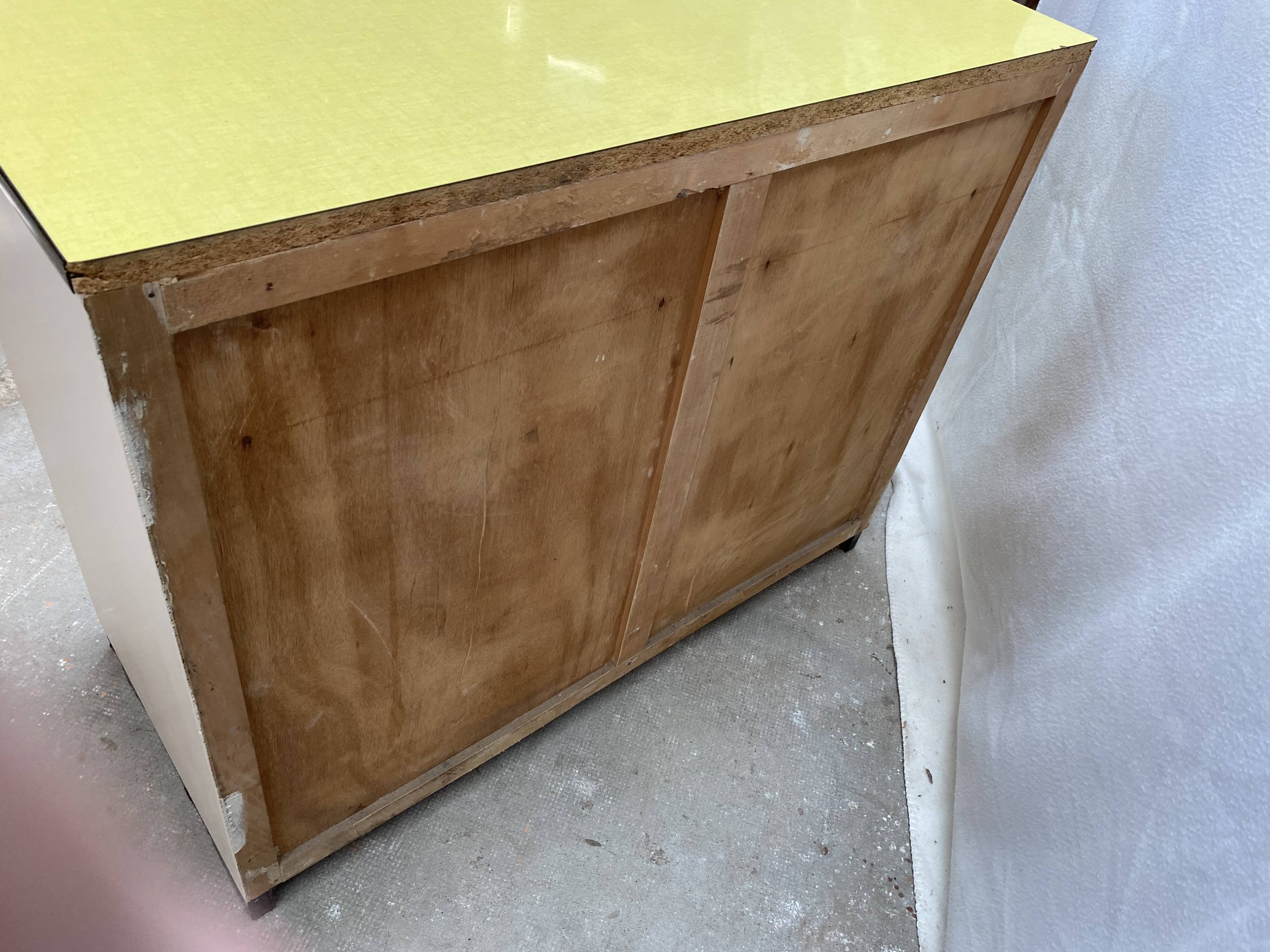 Yellow formica sideboard