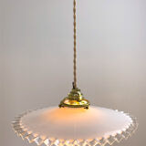 Opaline suspension with two-sided