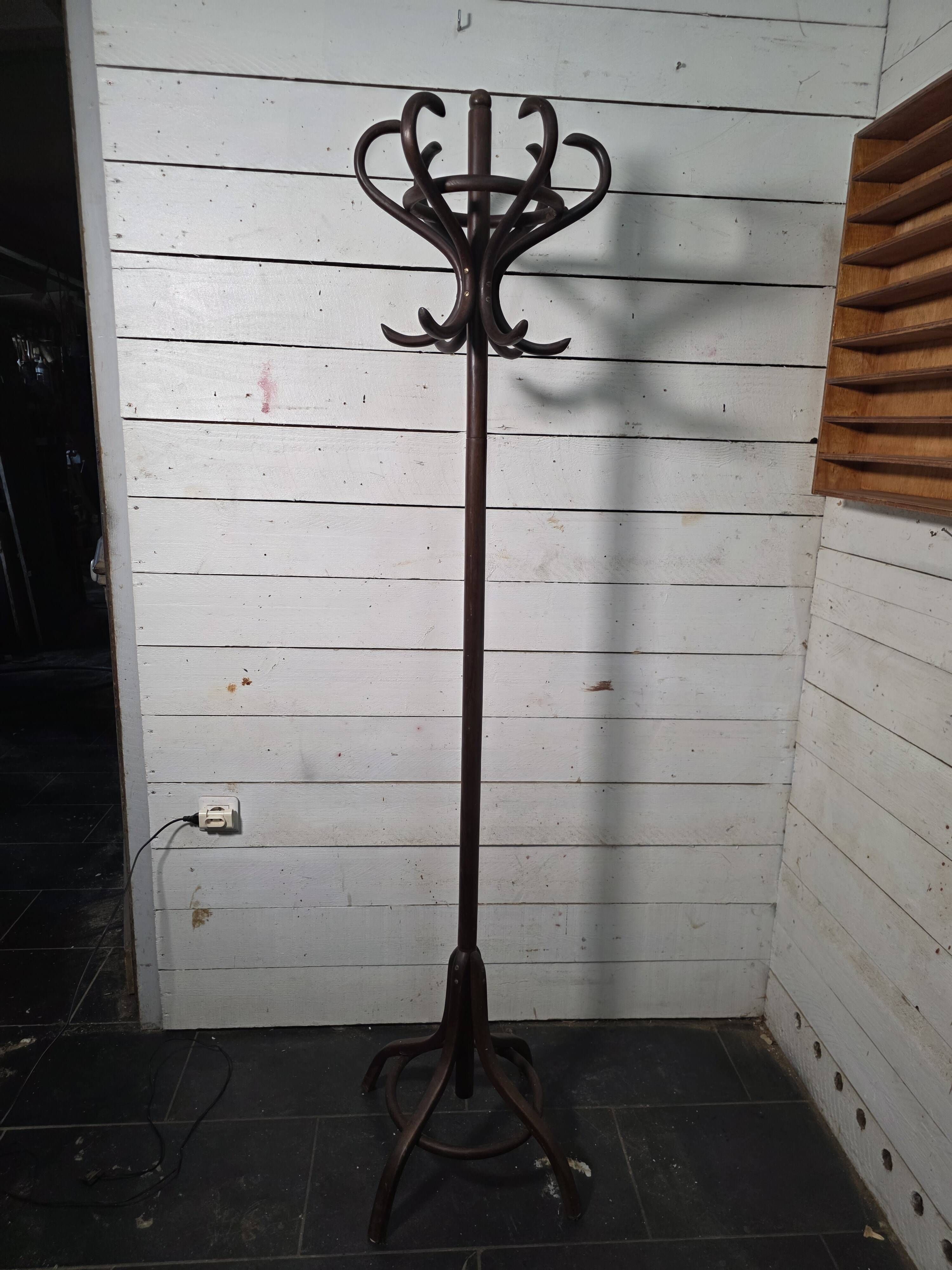 Curved antique wooden parrot