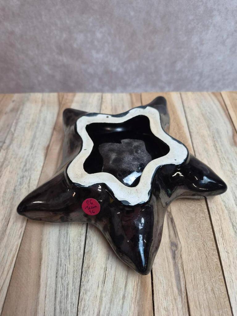 Vintage starfish bowl in ceramic Vallauris red and black lava style.