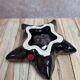 Vintage starfish bowl in ceramic Vallauris red and black lava style.
