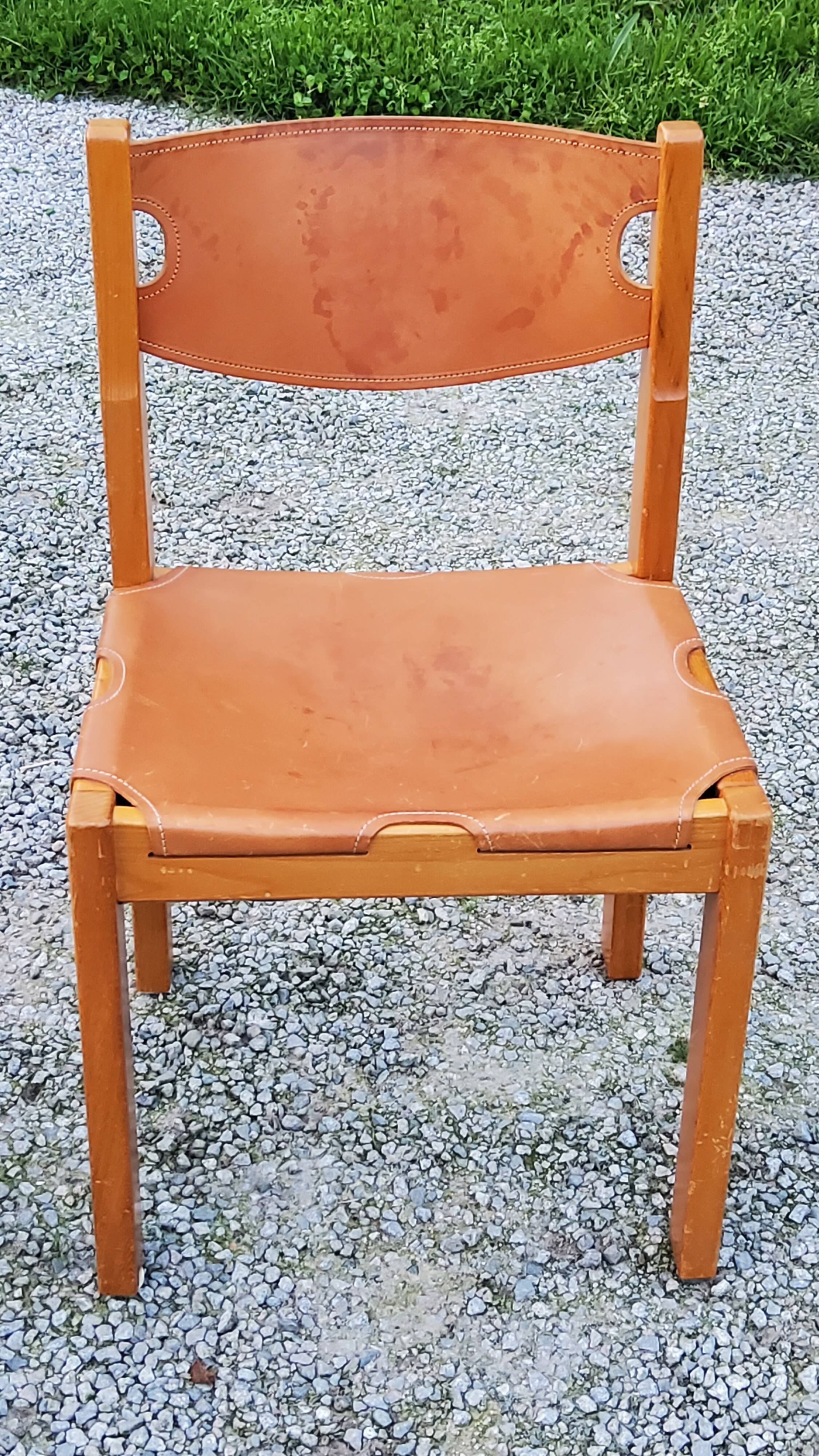 Pair of brutalist chairs in elm and stretched leather with saddle stitching Self publisher