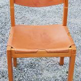 Pair of brutalist chairs in elm and stretched leather with saddle stitching Self publisher