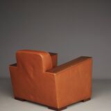 Paire de fauteuils Art Déco en cuir. Années 40.