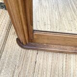 Beveled art deco mirror, carved wood