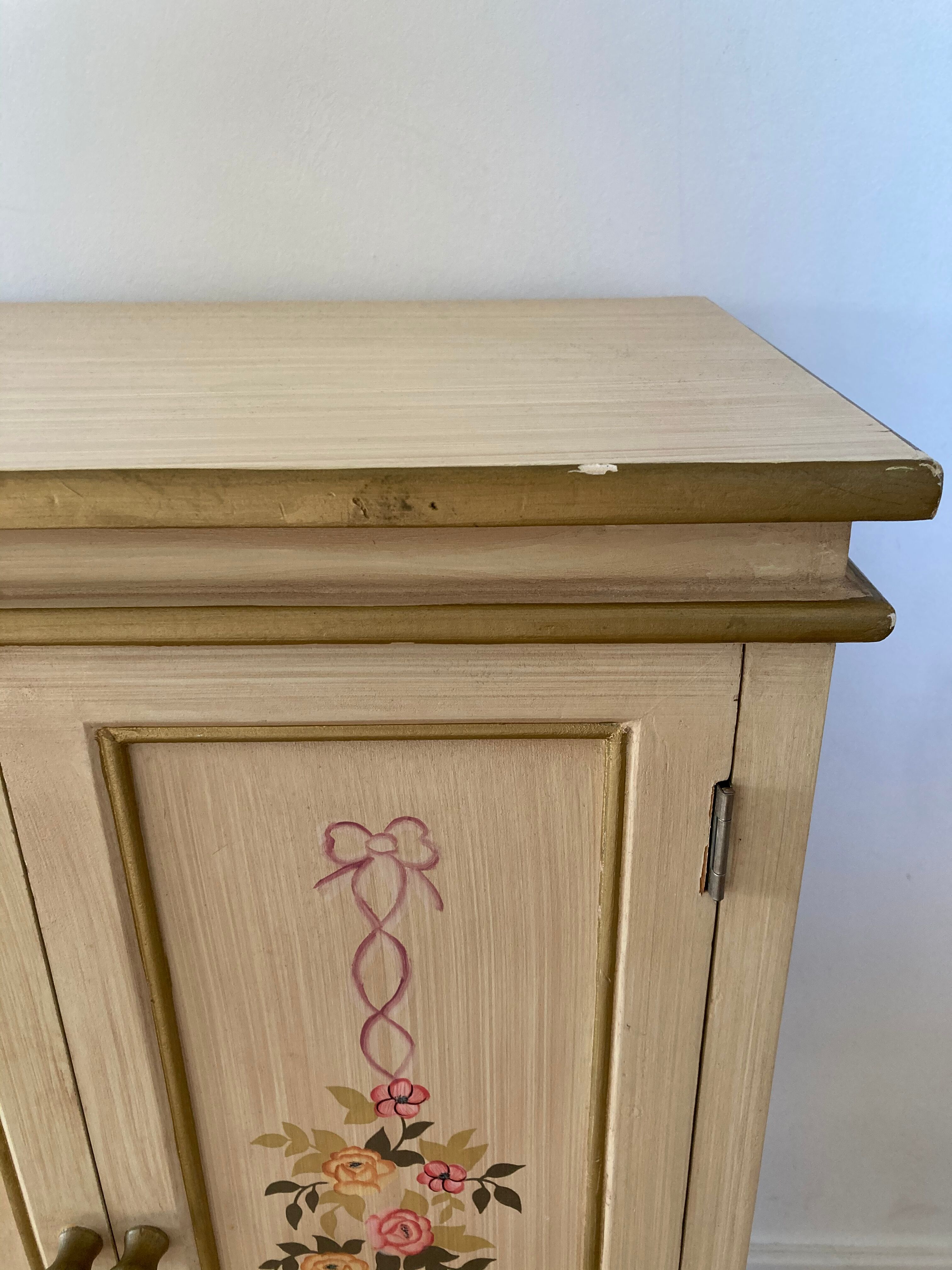 2-door flowered wooden cabinet