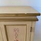 2-door flowered wooden cabinet