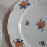 set of 4 dessert plates in white Limoges porcelain with flowers, the edge of one is different