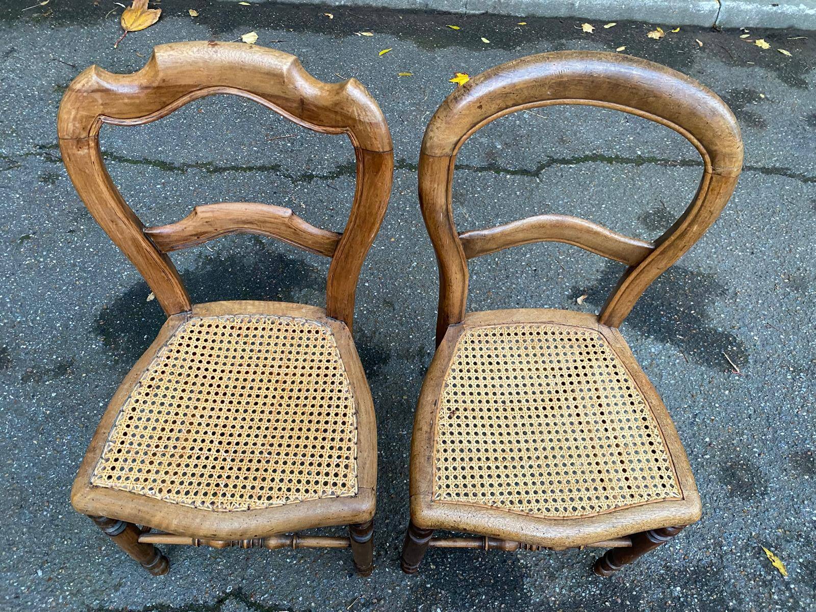 Two Louis Philippe cane chairs in solid carved wood from the 20th century