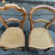 Two Louis Philippe cane chairs in solid carved wood from the 20th century