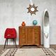 Art Deco vintage commode with tapered legs.