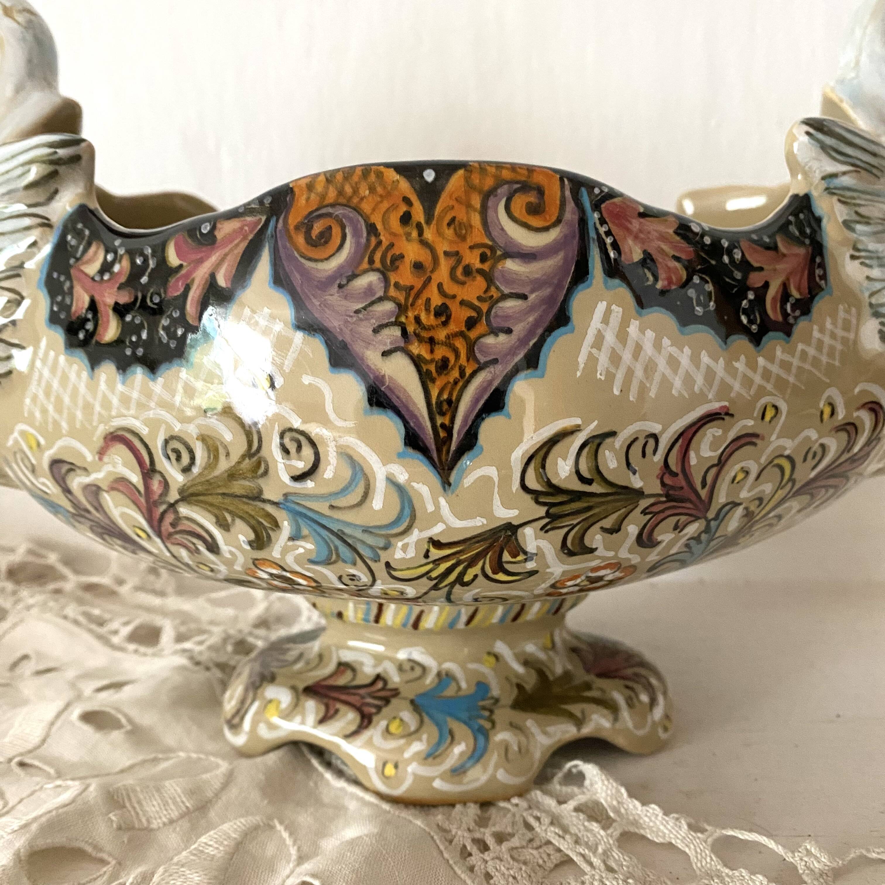 Molaroni planter, Pesaro, Italy, swans