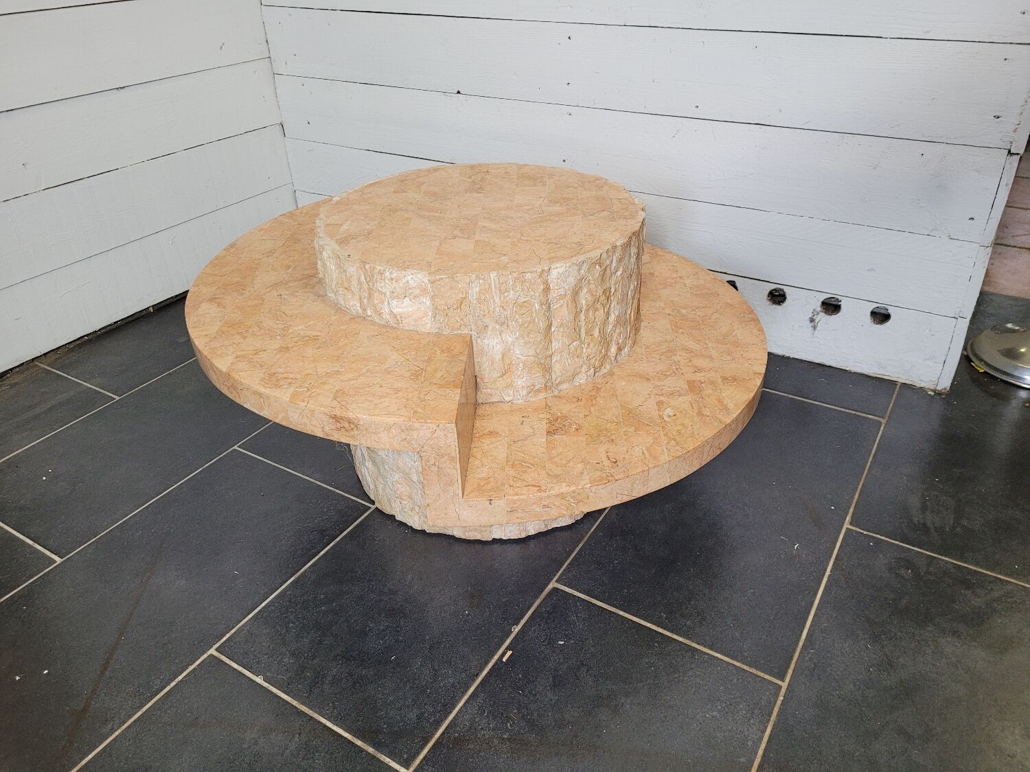Round stone coffee table by Magnussen Ponte