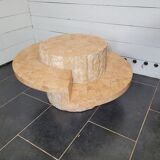 Round stone coffee table by Magnussen Ponte