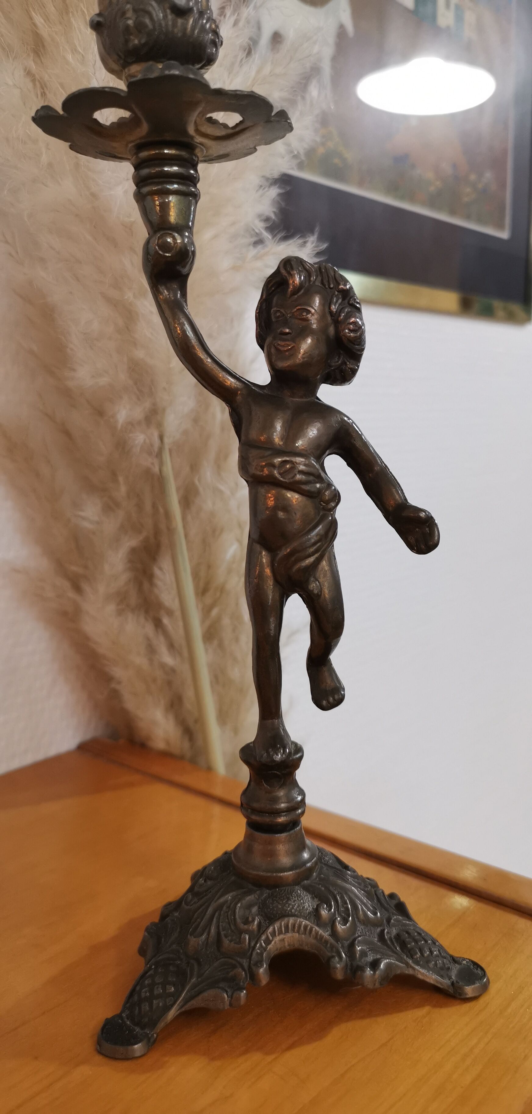 Pair of antique candlesticks in bronze and brass