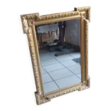 Antique mirror in wood and gilded stucco, neo Louis XVI style.