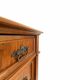 Antique walnut commode with bronze handles in the shape of a lion's mask,