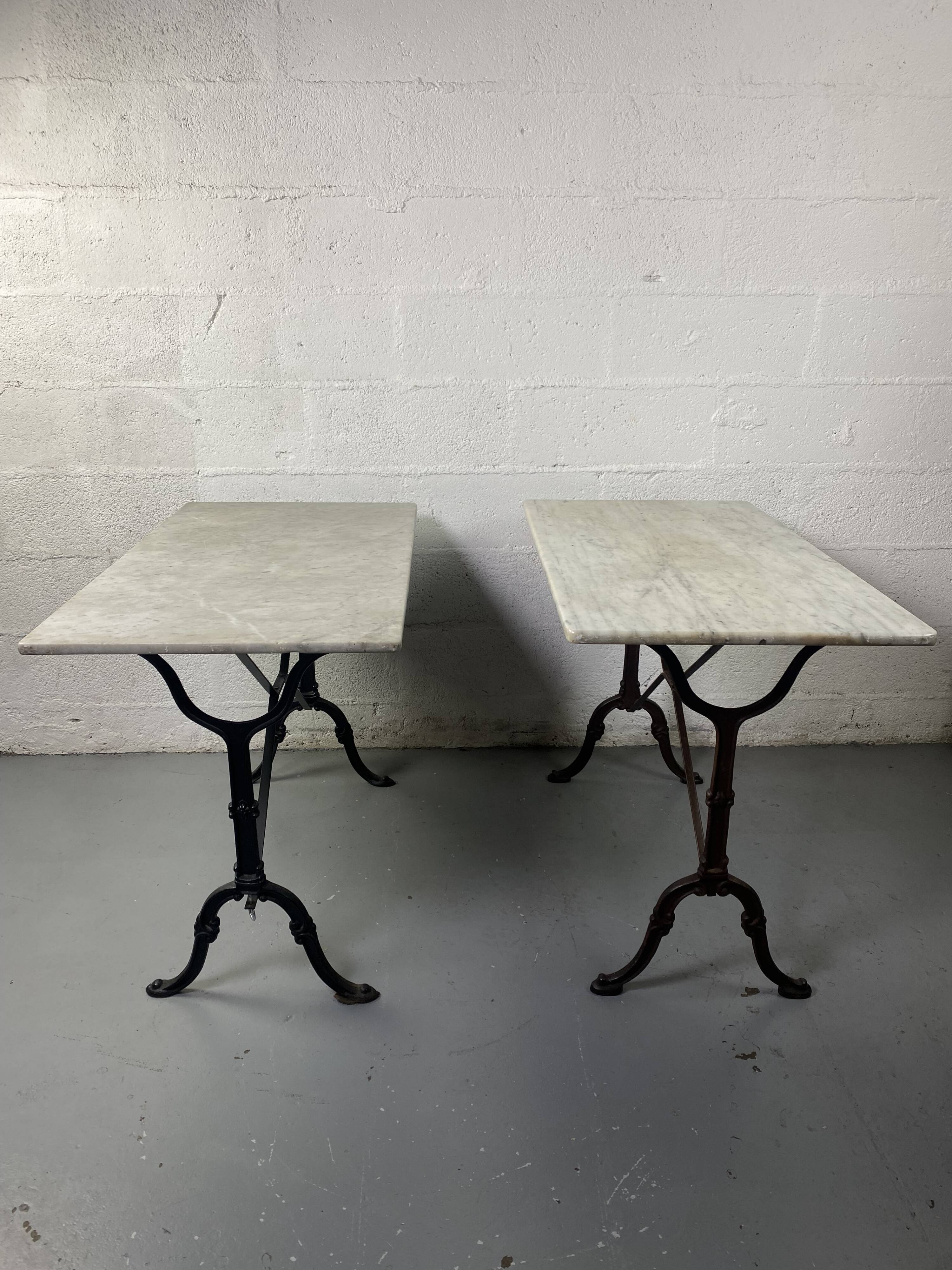 Set of two bistro tables in marble and wrought iron