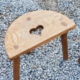Pair of shepherd's stools in tripod oak décor in the heart