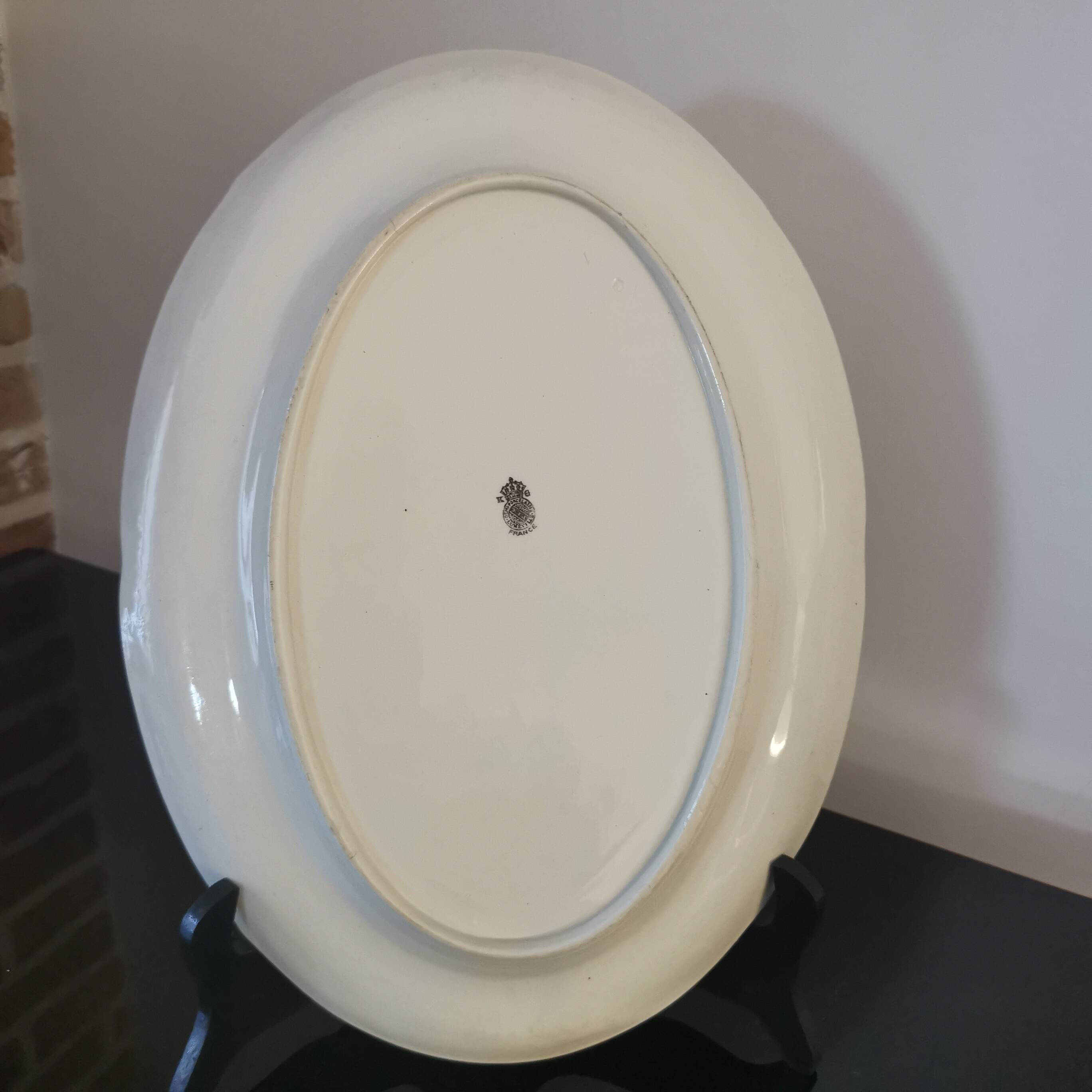 Oval white earthenware dish stamped K&G, Lunéville