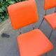 Formica leatherette chair with orange table, vintage 70s Space Age