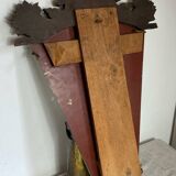 Antique wooden mirror with an unusual shape