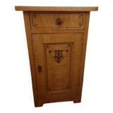 Vintage wooden bedside table painted brown, with a drawer and door, painted decoration from the 1890s.