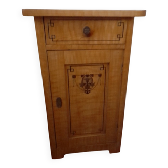 Vintage wooden bedside table painted brown, with a drawer and door, painted decoration from the 1890s.