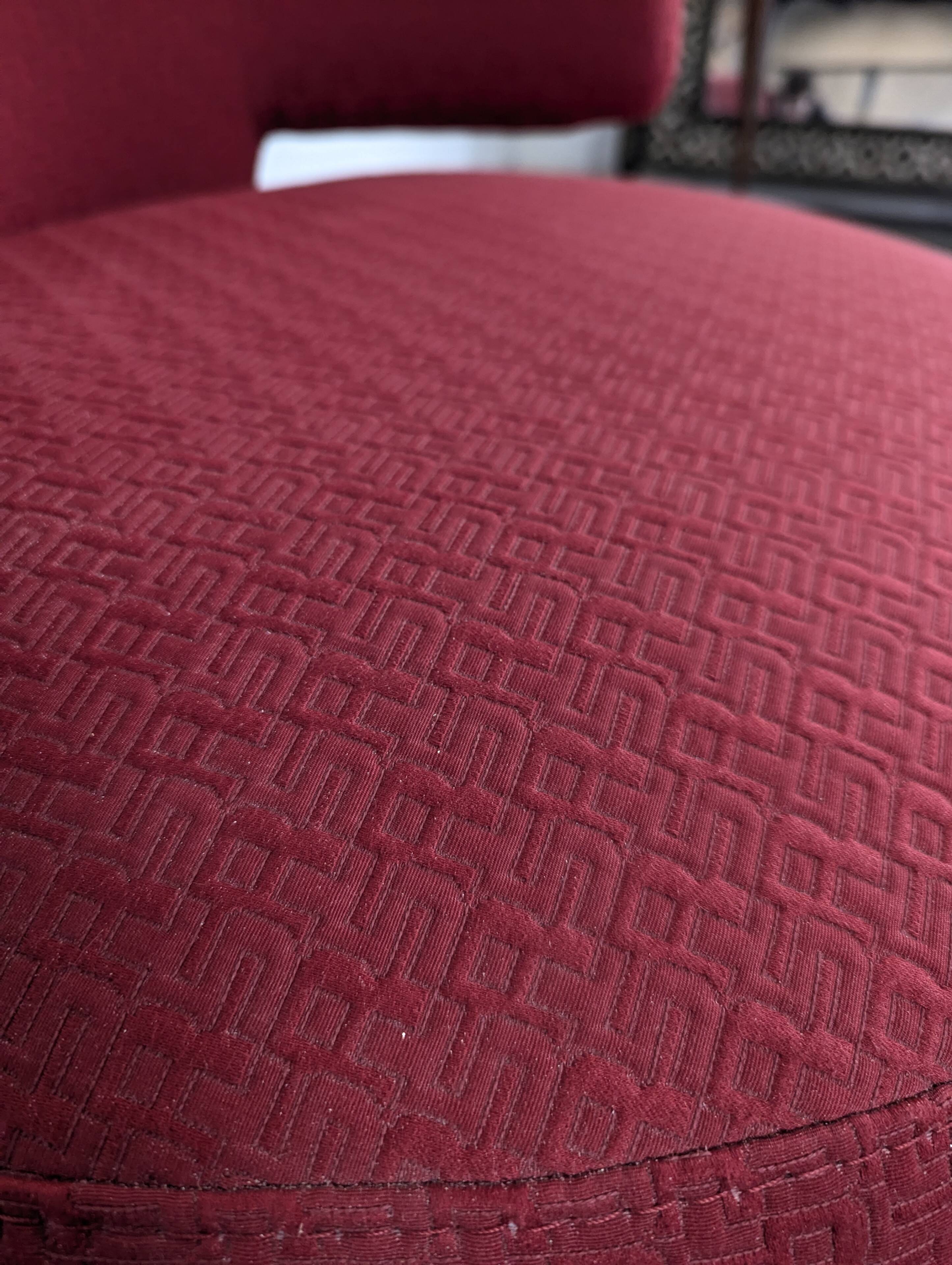 Roche Bobois swivel chair in red fabric with 2000s patterns.