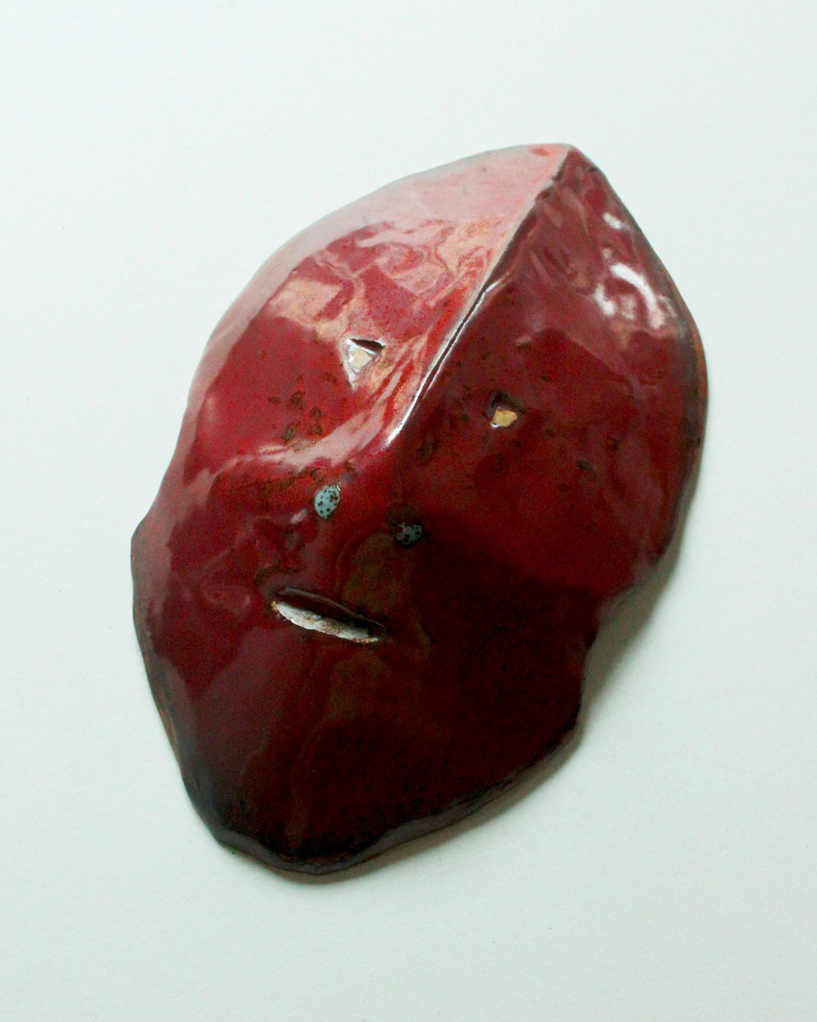 Glazed red ceramic mask, in the style of Accolay, 1950s / 60s.
