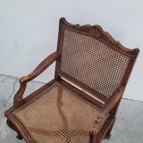 Louis XV Regency cane armchair leather armrests decorated with shell