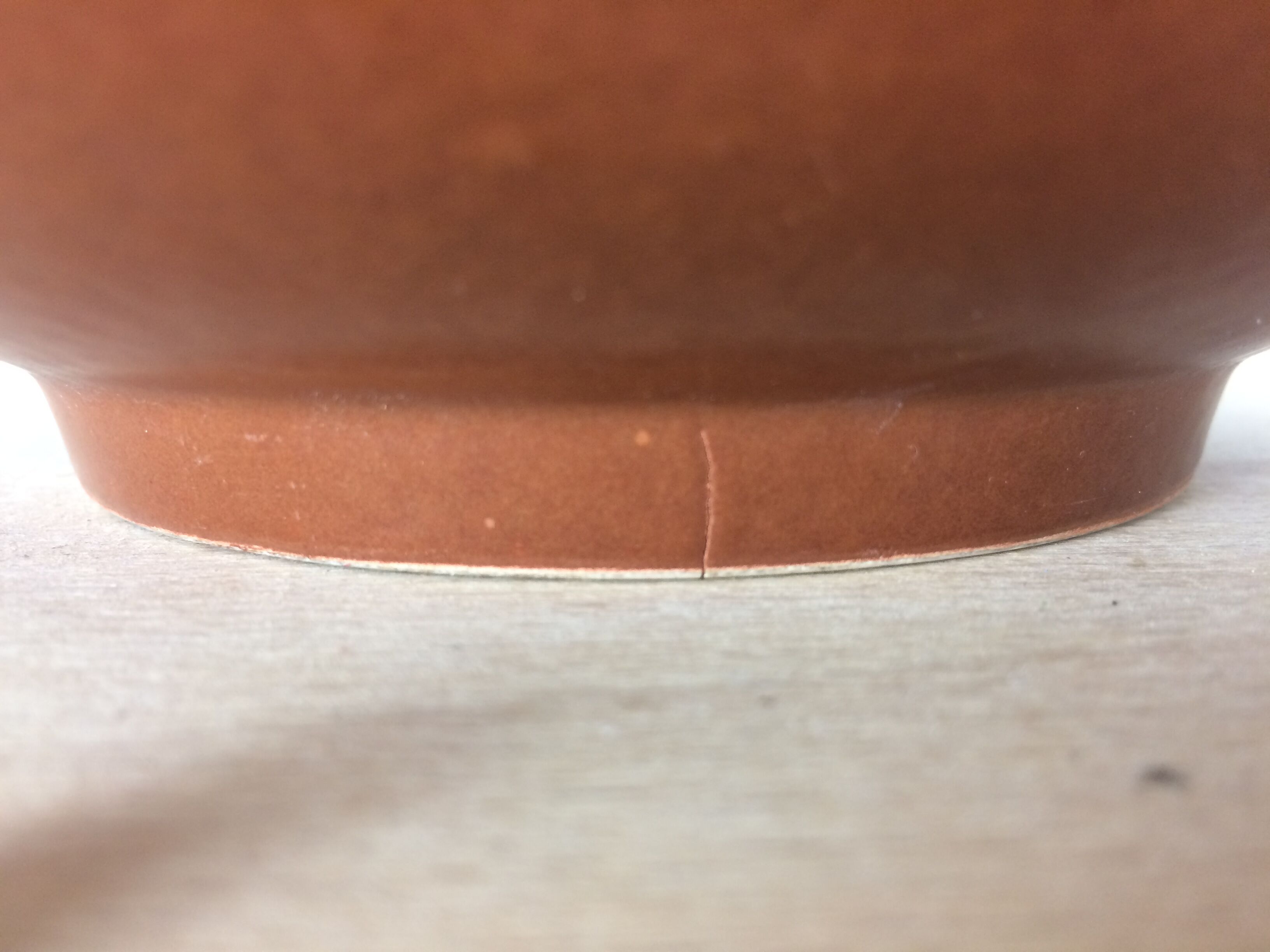 Orange and brown ceramic salad