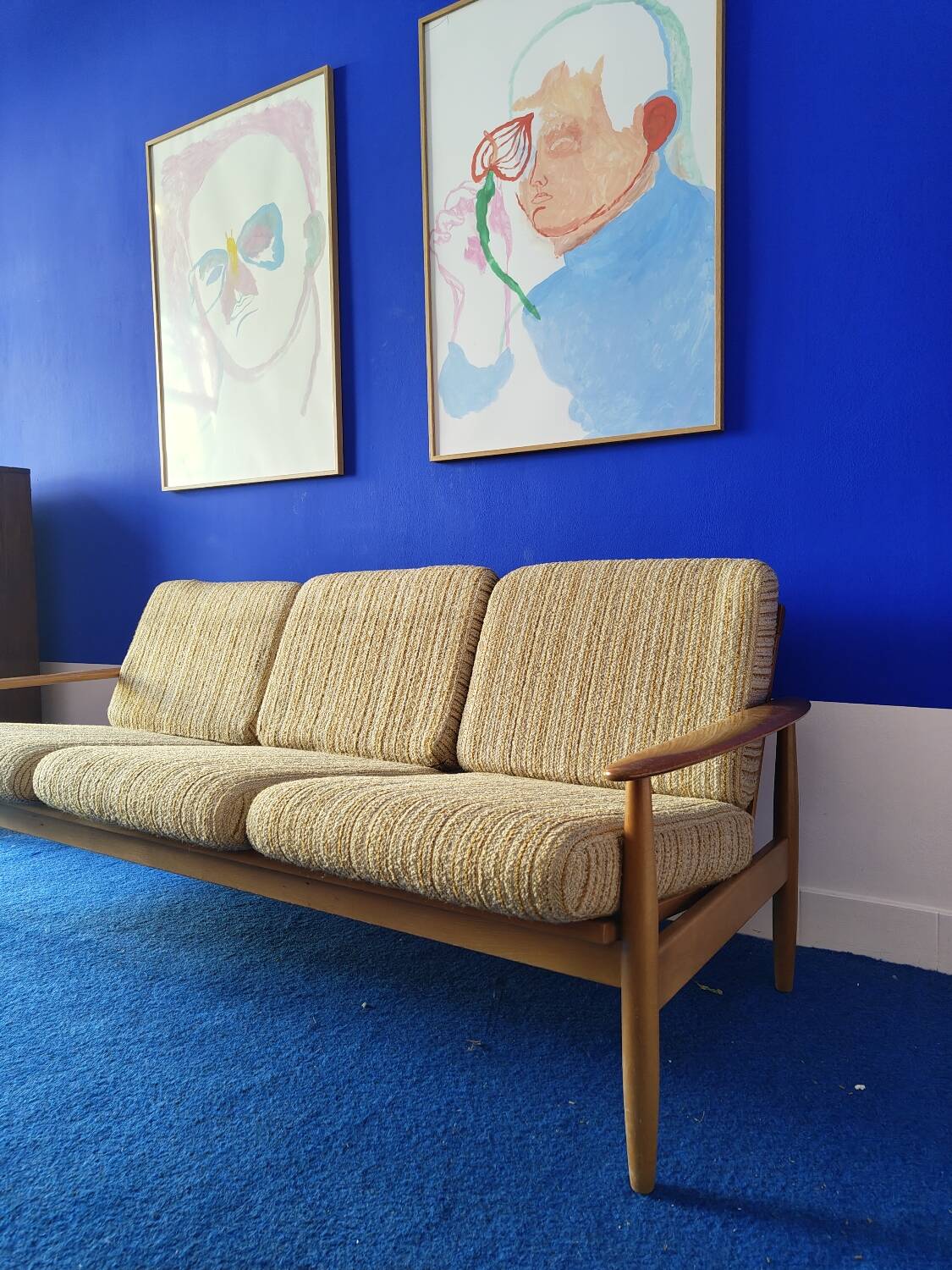 Scandinavian sofa in wood and vintage fabric from the 60s