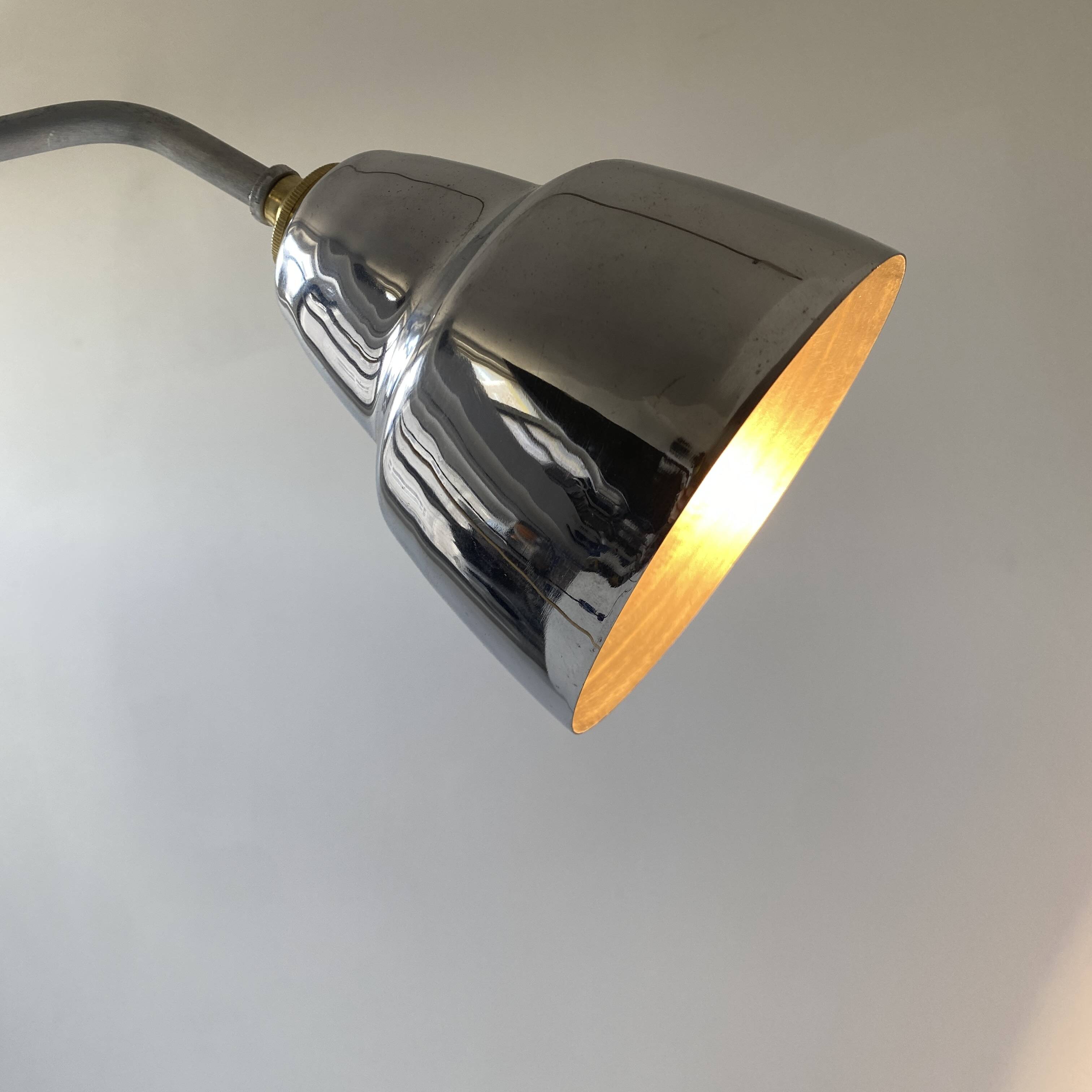 Old articulated industrial workshop lamp