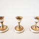 Lot of old candlesticks in brass and mother-of-pearl