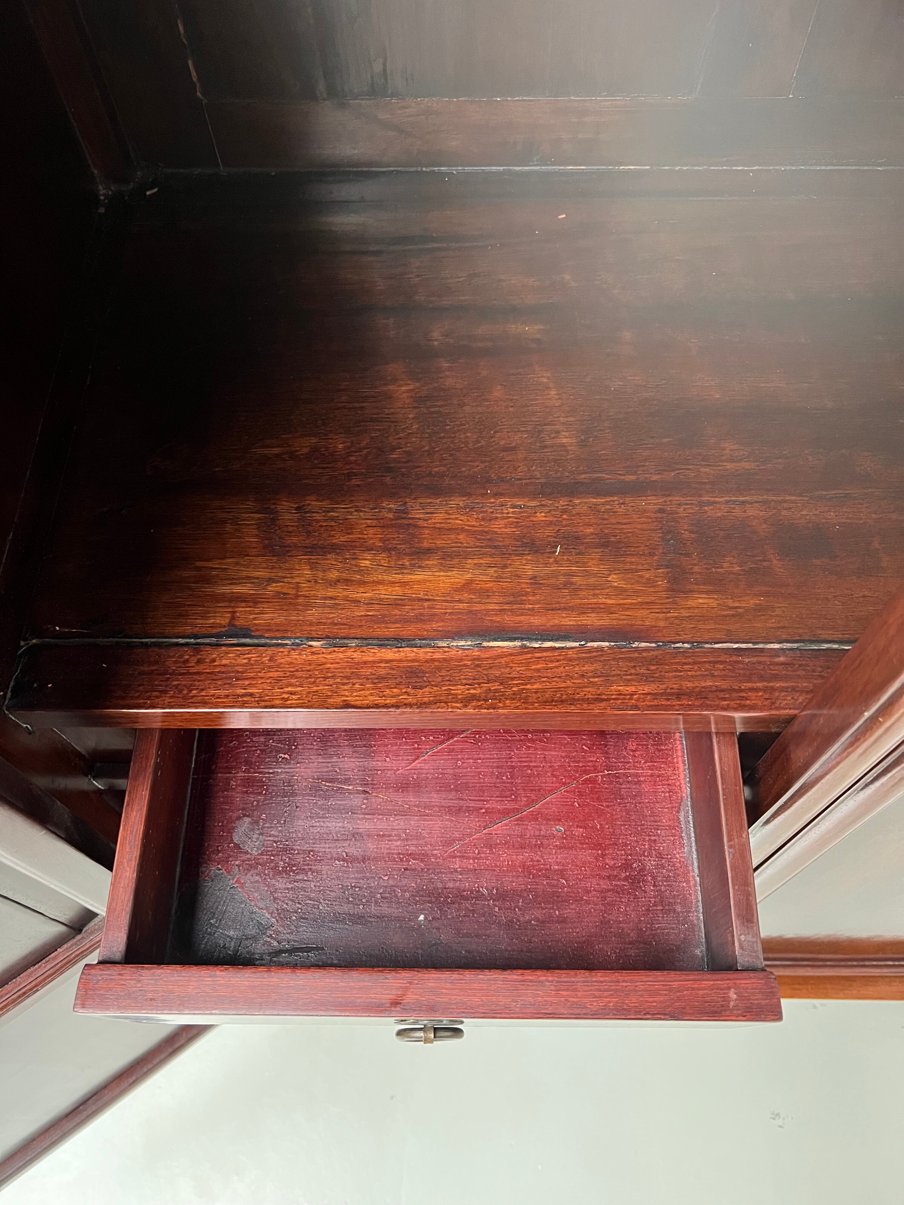 Chinese trapezoidal roller cabinet, made of rosewood.