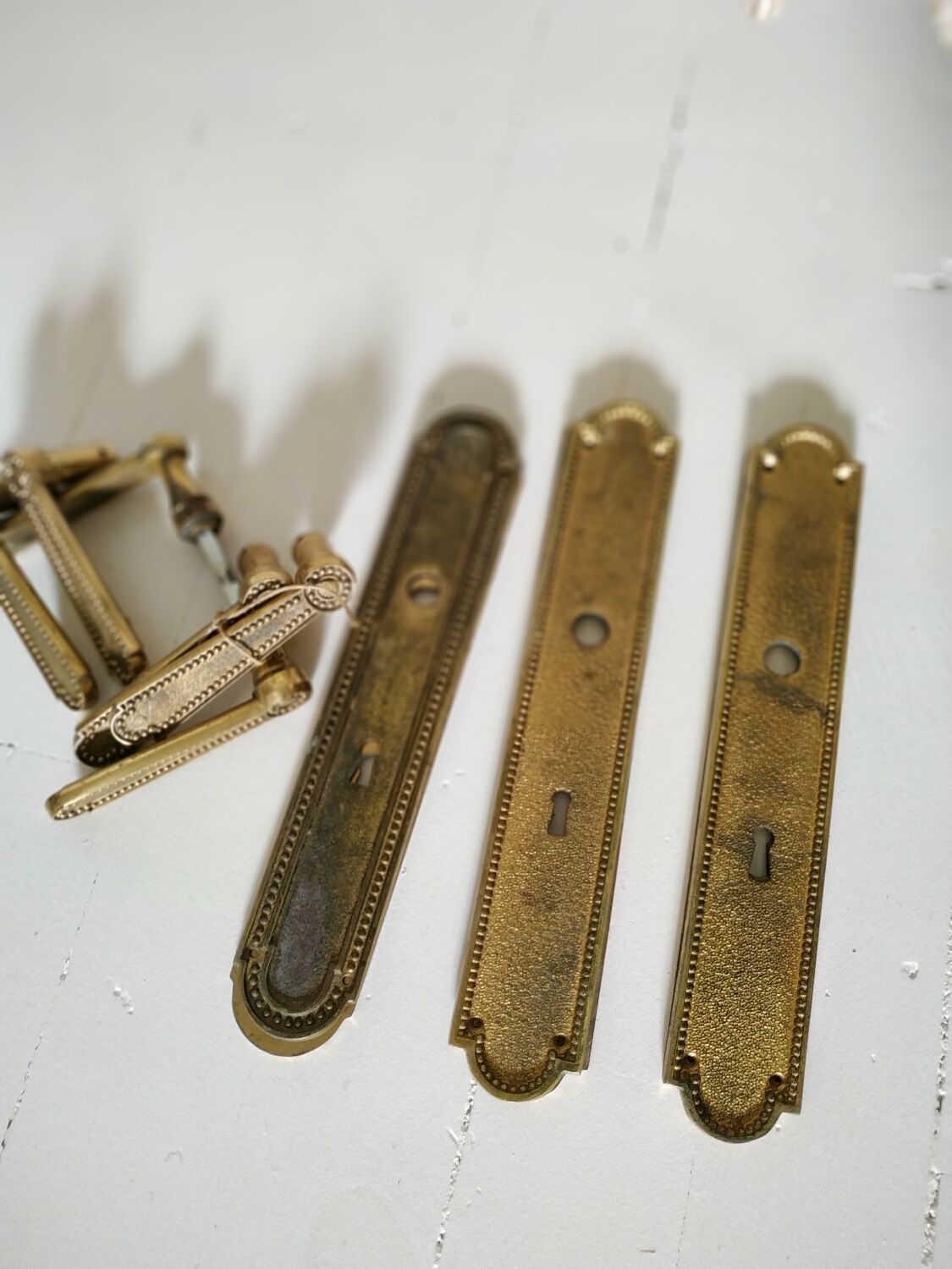 Cleanliness plate and bronze door handles