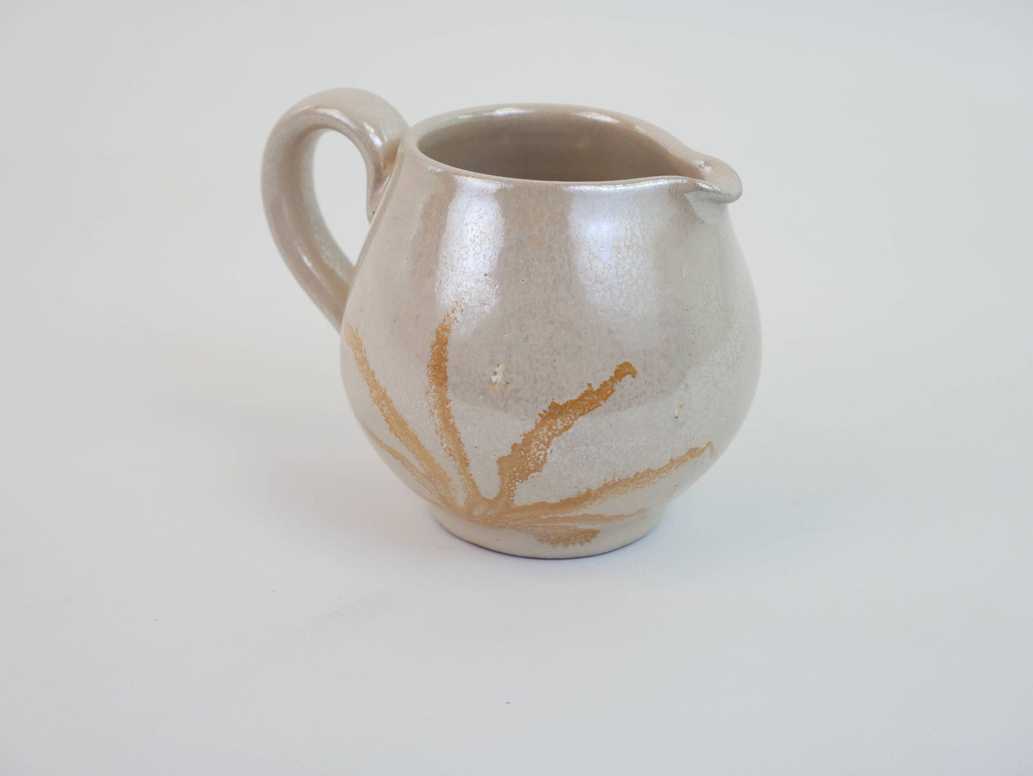 Pair of ceramic milk jugs signed La Roue Vallauris