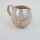 Pair of ceramic milk jugs signed La Roue Vallauris