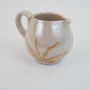 Pair of ceramic milk jugs signed La Roue Vallauris