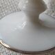 White opaline vase decorated with roses