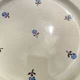 Flat round earthenware dish