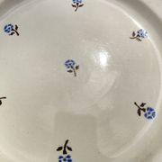 Flat round earthenware dish