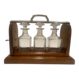 Portable Art Deco liquor cabinet in mahogany & metal with 3 Baccarat crystal bottles.