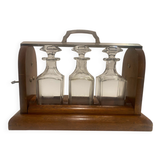 Portable Art Deco liquor cabinet in mahogany & metal with 3 Baccarat crystal bottles.