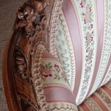 Pair of carved bergere armchairs