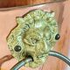 Vintage copper lion's head umbrella holder
