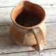 Milk pot in sizzles