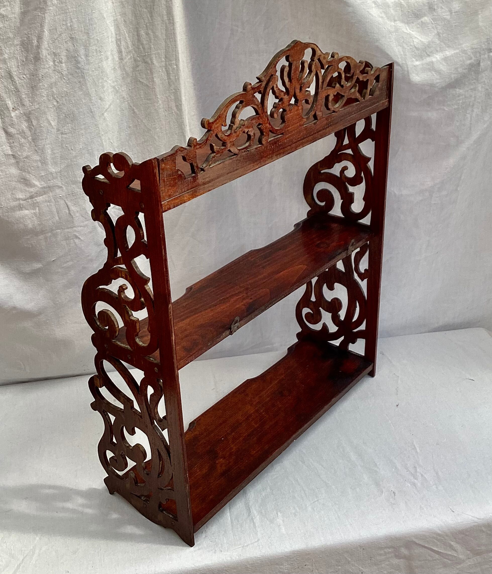 Old wall shelf in worked wood dimension: height -67cm- width --55cm-